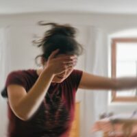 Woman Suffering from Dizziness